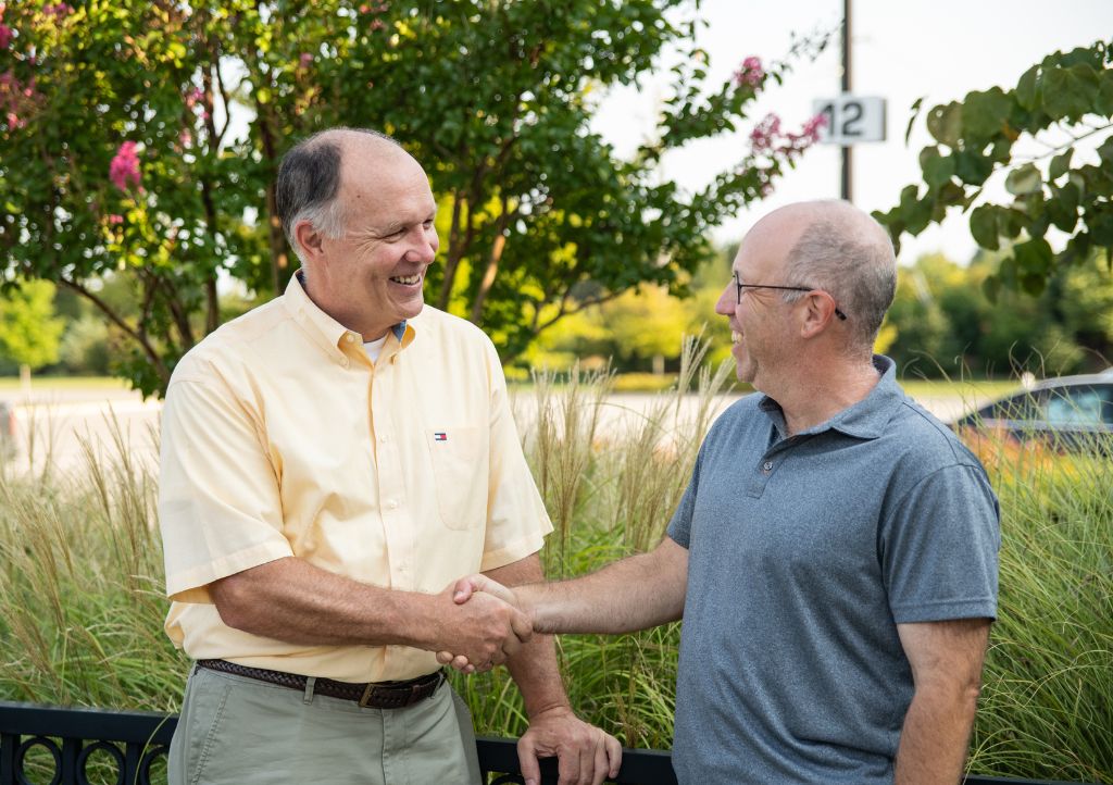 Veterinary practice owner meeting with advisors during negotiation of a letter of intent.