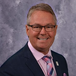 Headshot of Dr. Roger Redman, expert in veterinary practice sales.